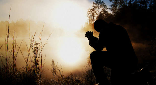 prayer-man-kneeling-outside-sunlight-creativeswap.JPG