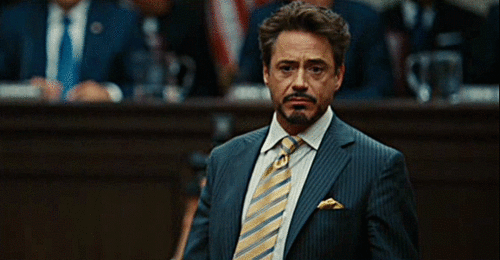 Robert-Downey-Jr.-Throwing-Up-Peace-Signs-As-Tony-Stark.gif