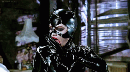 catwoman-lick-hands.gif