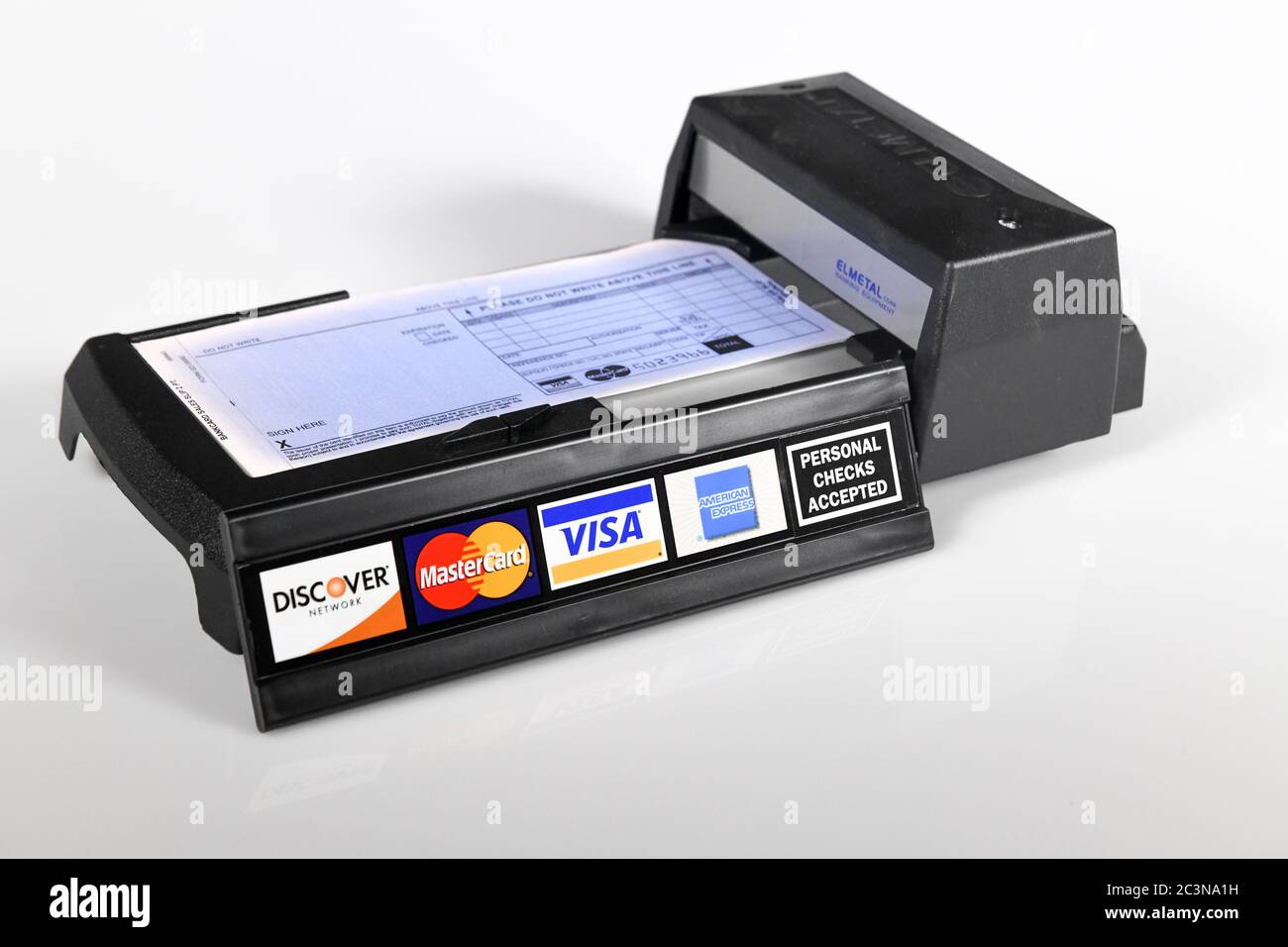 manual-credit-card-machine-old-technology-a-manually-operated-credit-card-imprinter-with-credit-card-logos-personal-check-sign-2C3NA1H.jpg