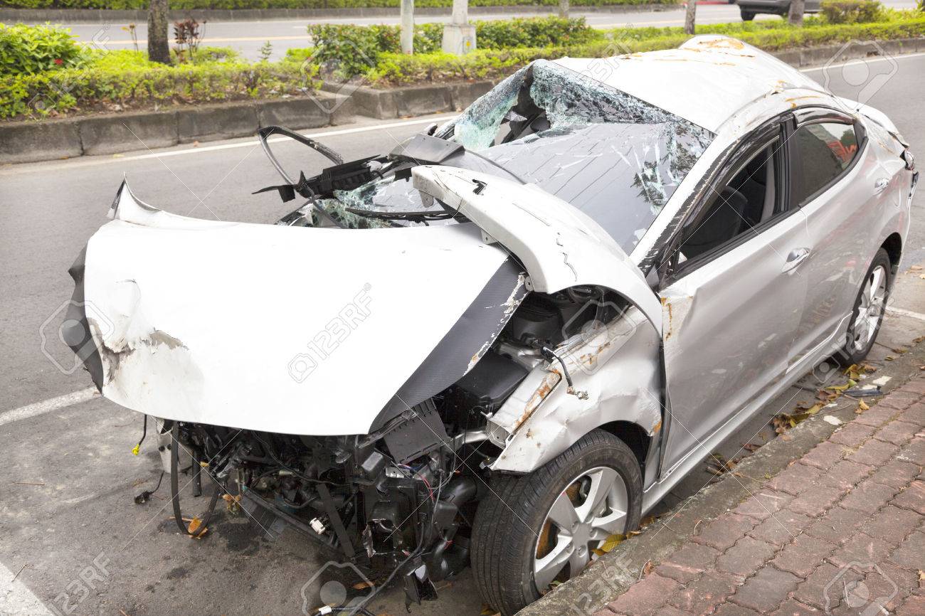24611540-car-accident-and-wrecked-car-on-the-road.jpg