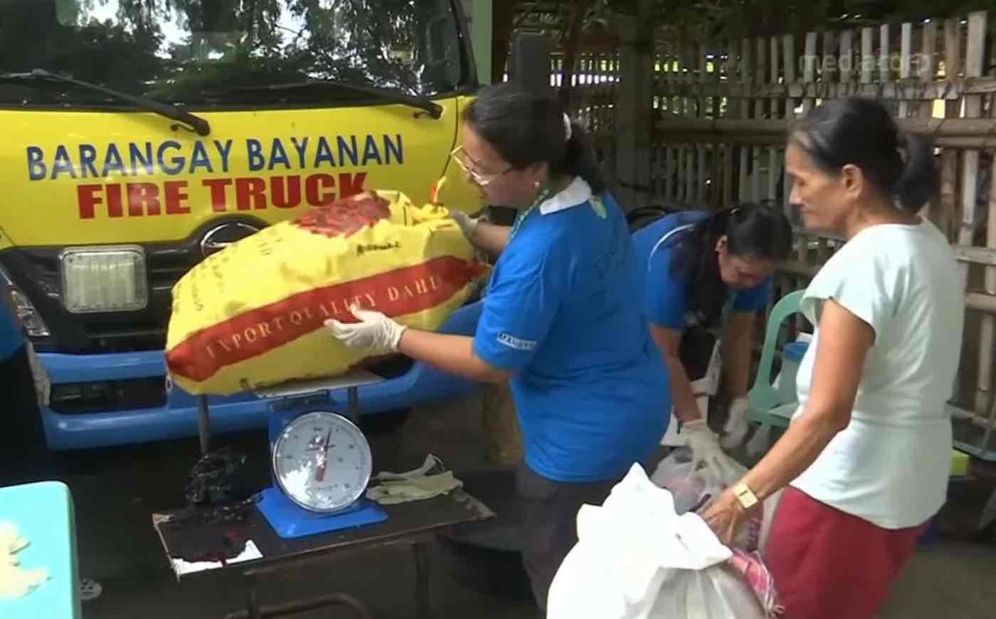 Villager-Trading-Plastic-for-Rice-CNA-Youtube-Screenshot.jpg