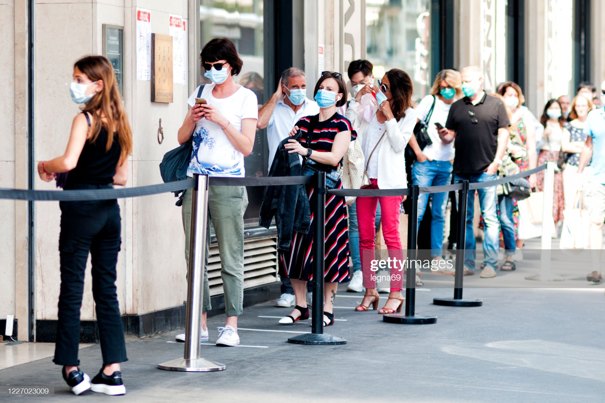 queue-in-front-of-a-shop-during-pandemic-covid19-in-europe-people-a-picture-id1227023009