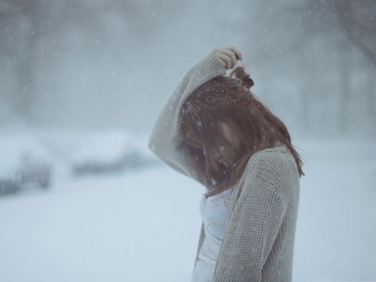 Sad-Girl-in-Winter-Flying-Snow-Around-the-Beautiful-Girl-Are-You-Cold-.jpg