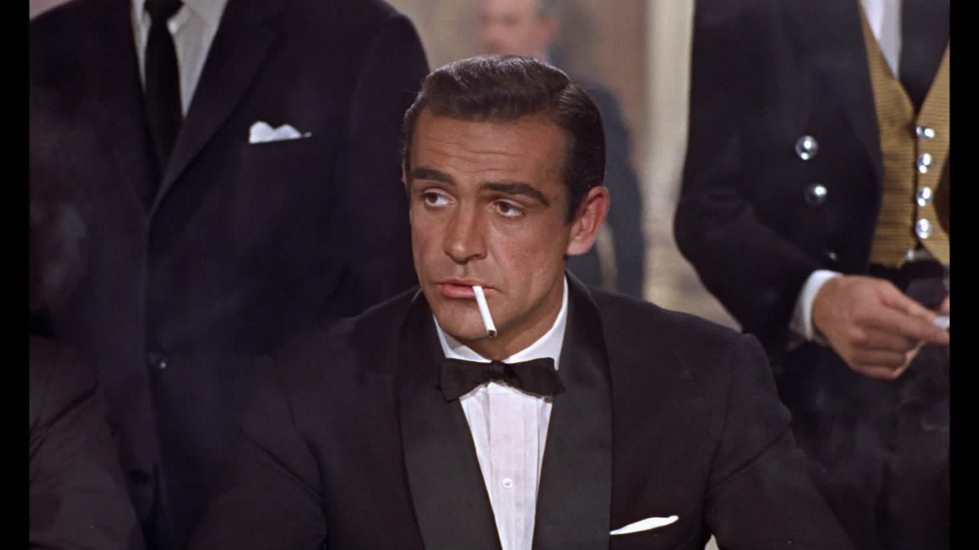 190801093318-the-movies-1960s-james-bond-ron-1-00001411.jpg