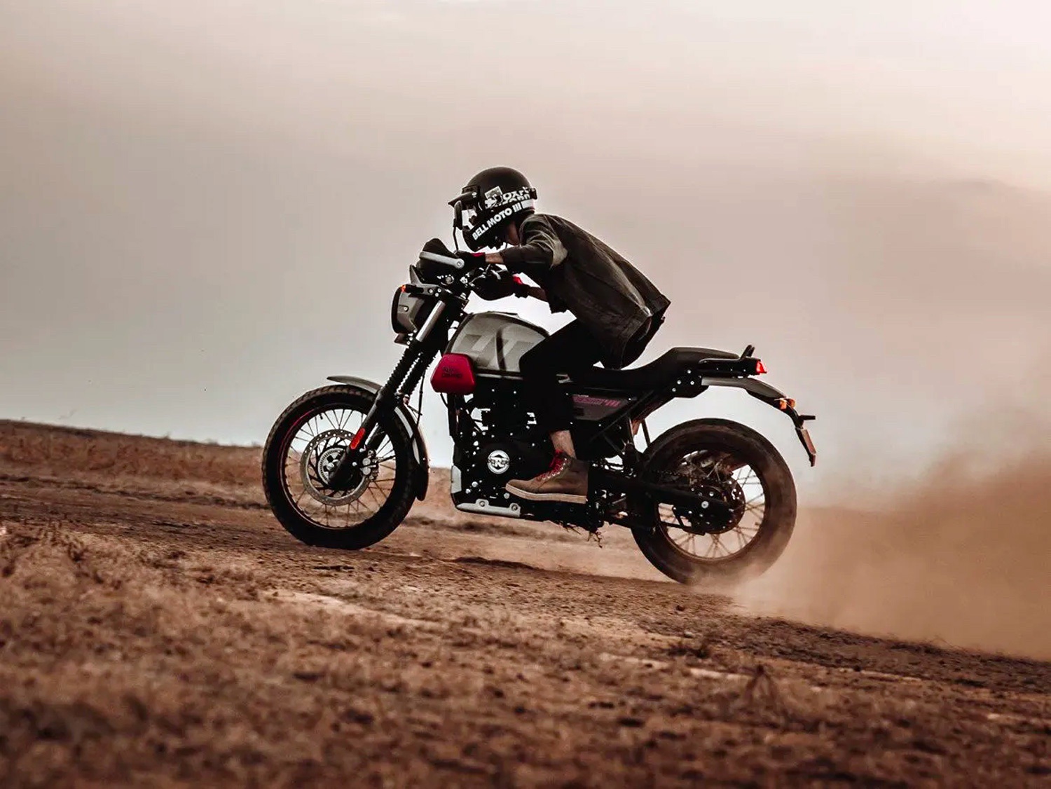 A 2022 Royal Enfield Scram 411 motorcycle on a dirt road