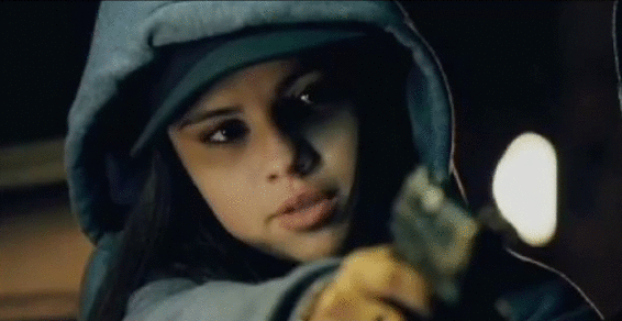 Selena-Gomez-pulls-gun-in-Getaway.gif