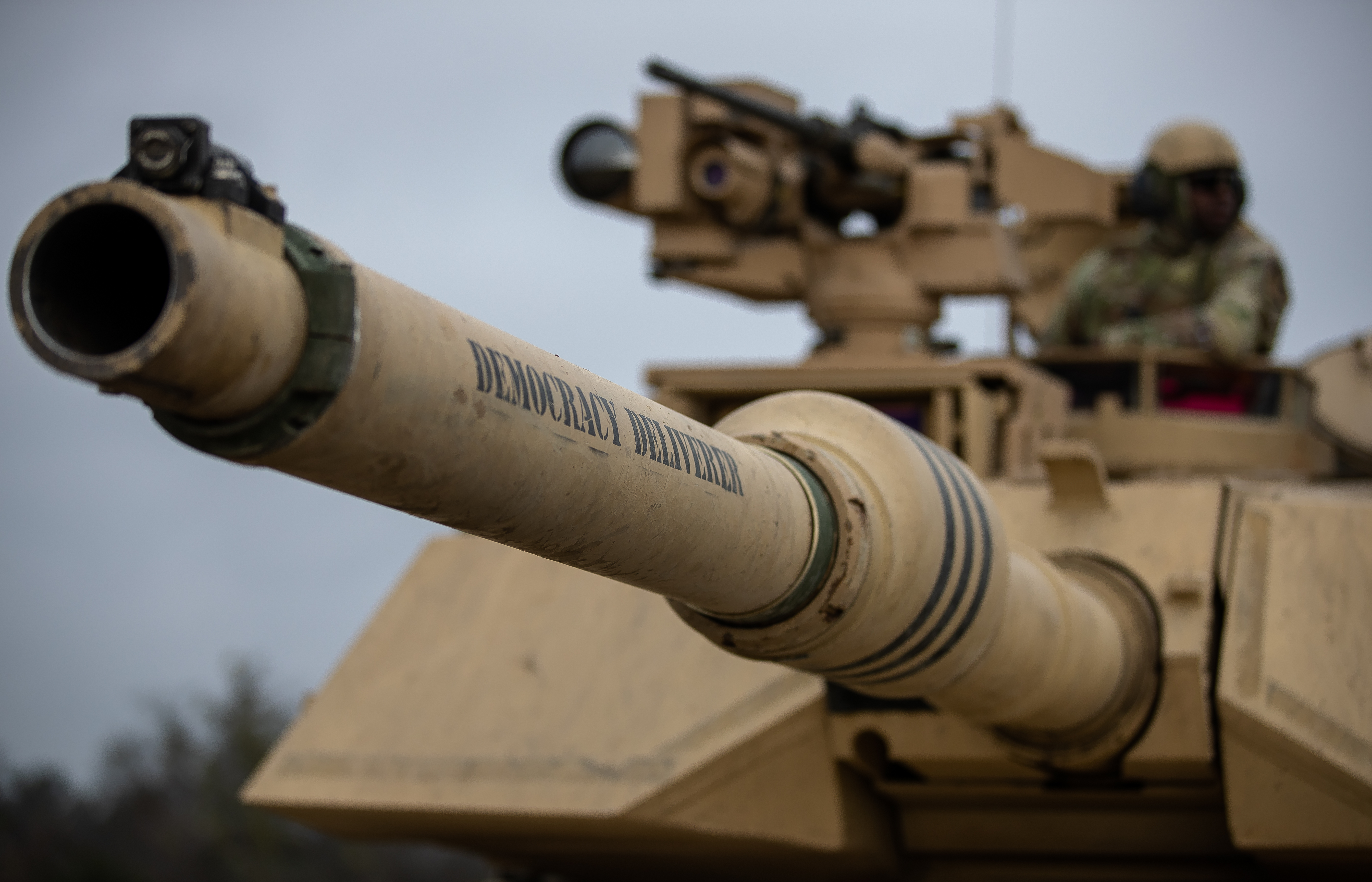 A tank named Democracy Deliverer stages prior to entering the live-fire range during the combined arms live-fire exercise (CALFEX) Feb. 5.