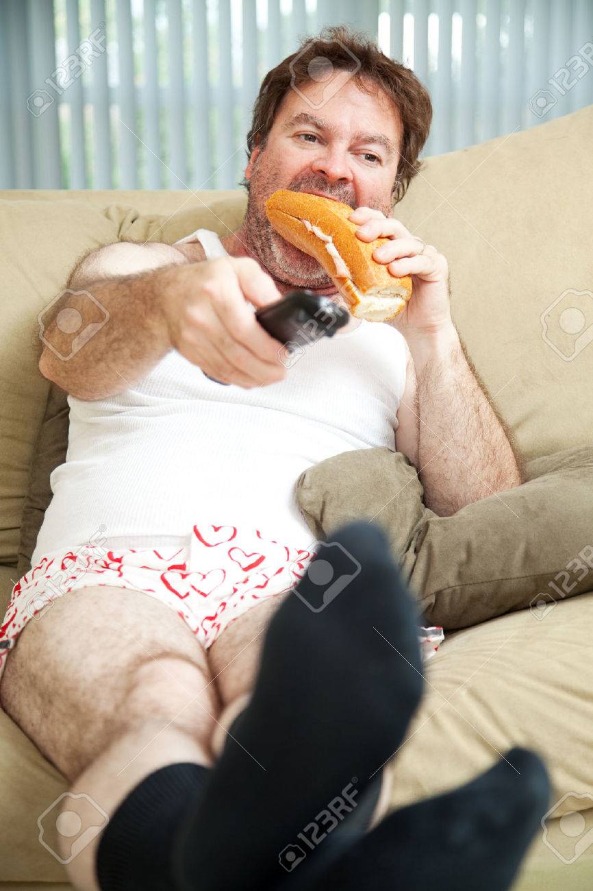 22482835-unemployed-man-sitting-on-the-couch-in-his-underwear-watching-tv-and-eating-a-sandwich-.jpg