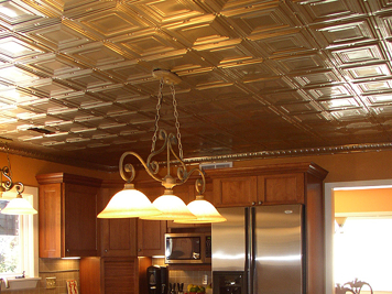 tin-ceiling-tiles-in-the-kitchen-with-stainless-steel-appliances-small.jpg