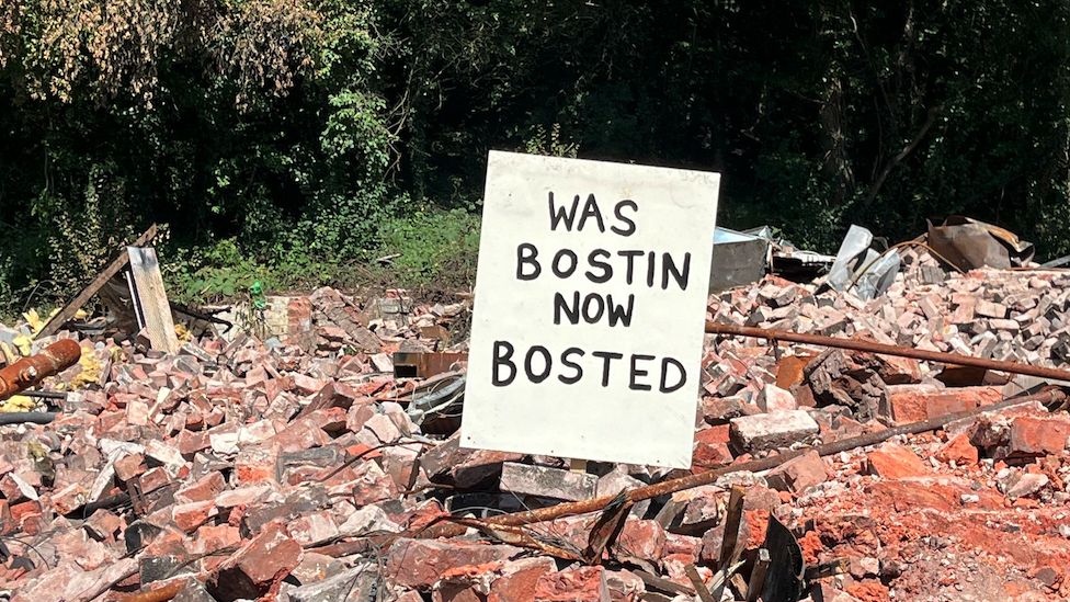 Sign reading: Was bostin now bosted
