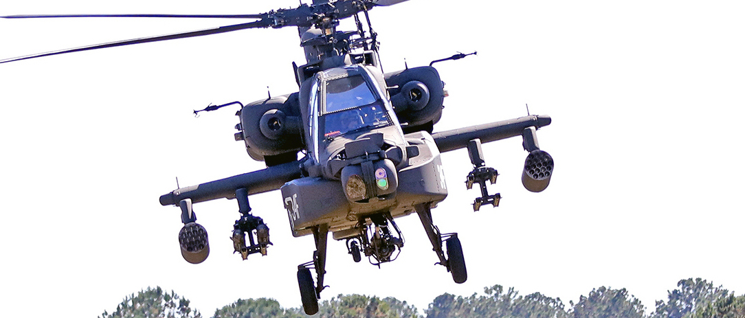 An AH-64E Apache Guardian and UH-60M Black Hawk helicopter conduct a multi-ship capabilities demonstration at Fort Rucker, Alabama, October 27, 2022. (U.S. Army photo by Lt. Col. Andy Thaggard)