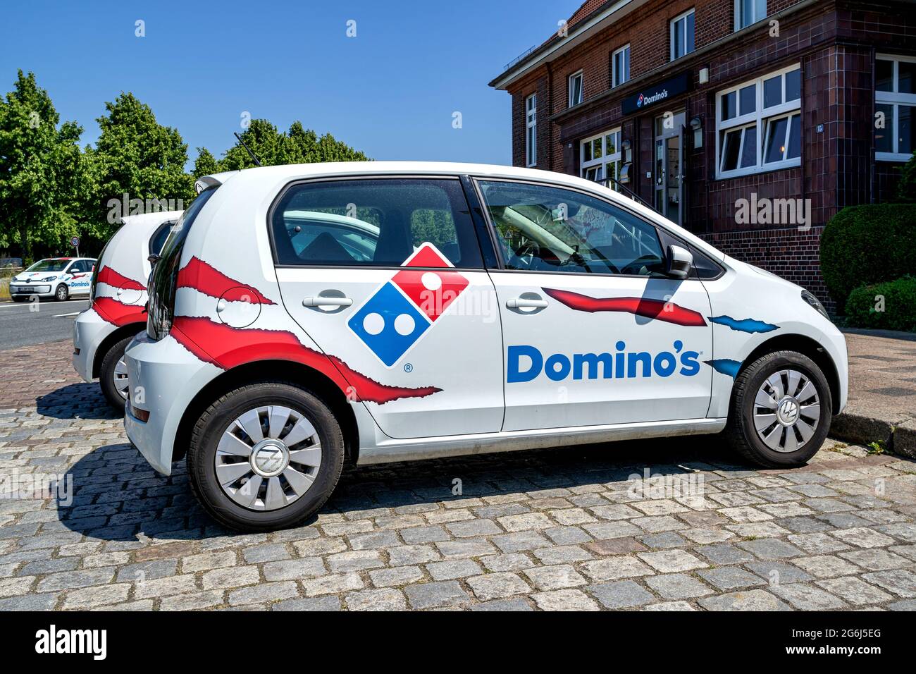 delivery-cars-at-dominos-restaurant-2G6J5EG.jpg