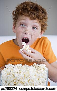 boy-eating-popcorn_~px268024.jpg