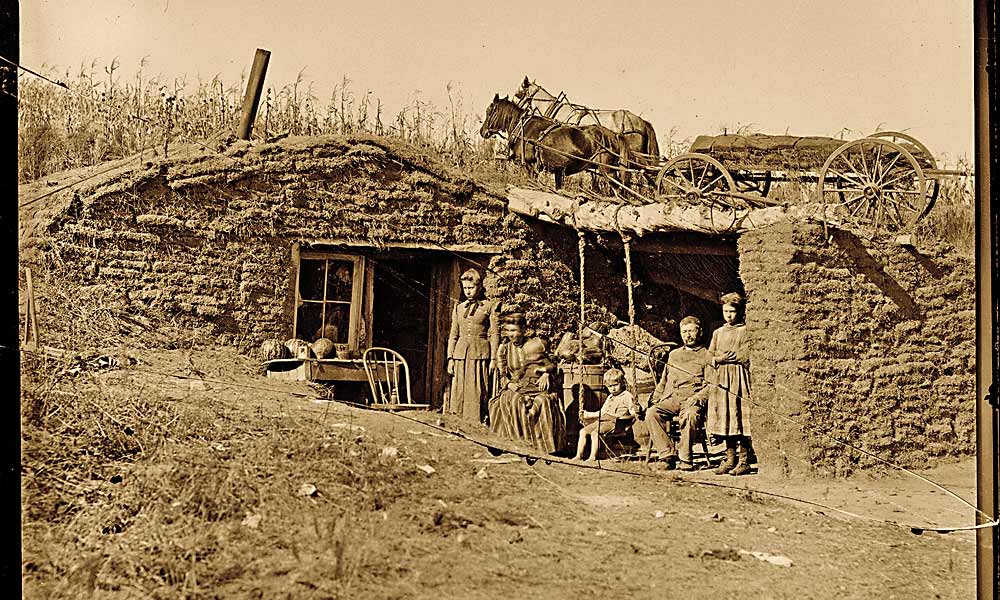 SF_NE_Lead_1892-a-family-posed-for-traveling-photographer-Solomon-D-Butcher-next-to-their-humble-abode-on-the-South-Loup-River-in-Custer-County.jpg