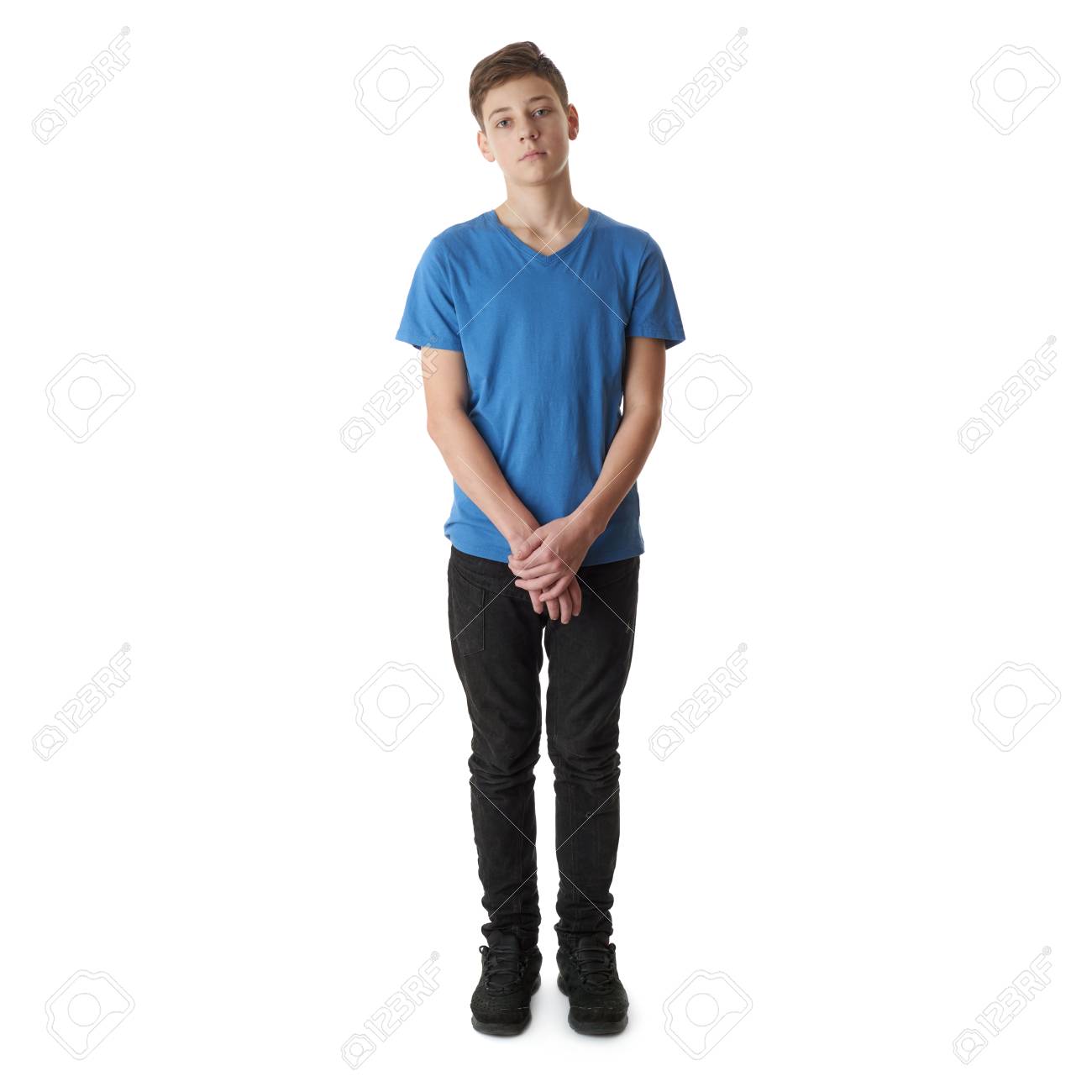 58115912-cute-teenager-boy-in-blue-t-shirt-standing-over-white-isolated-background-full-body.jpg