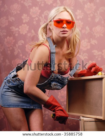 stock-photo-sexy-blond-with-screwdriver-35885758.jpg