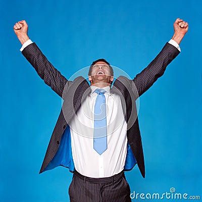 businessman-celebrating-arms-raised-air-9901594.jpg