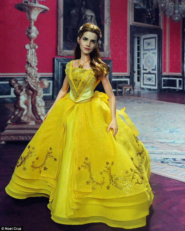 3C974D1400000578-4169254-The_custom_repaint_of_the_11_inch_28_cms_tall_Disney_Store_Belle-a-74_1485706466041.jpg