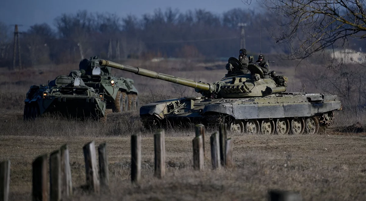 The T-72 battle tank (R).