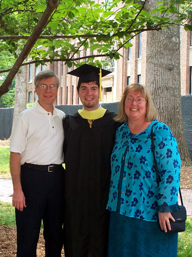 masters-graduation-dad-justin-mom.jpg