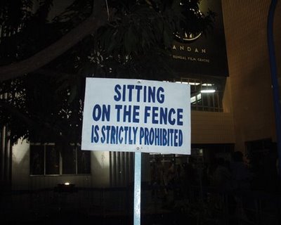 sittingonfence-prohibited.jpg