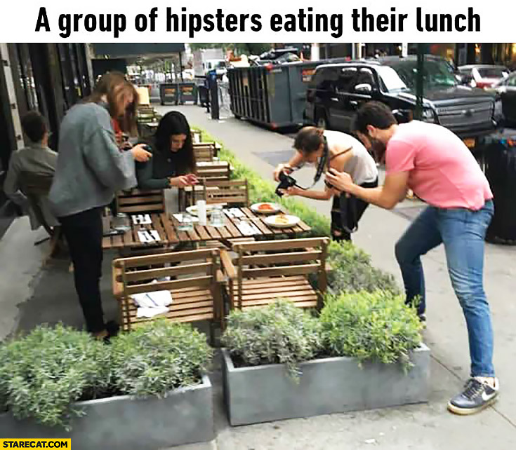 a-group-of-hipsters-eating-their-lunch-taking-photos-instead-of-eating.jpg