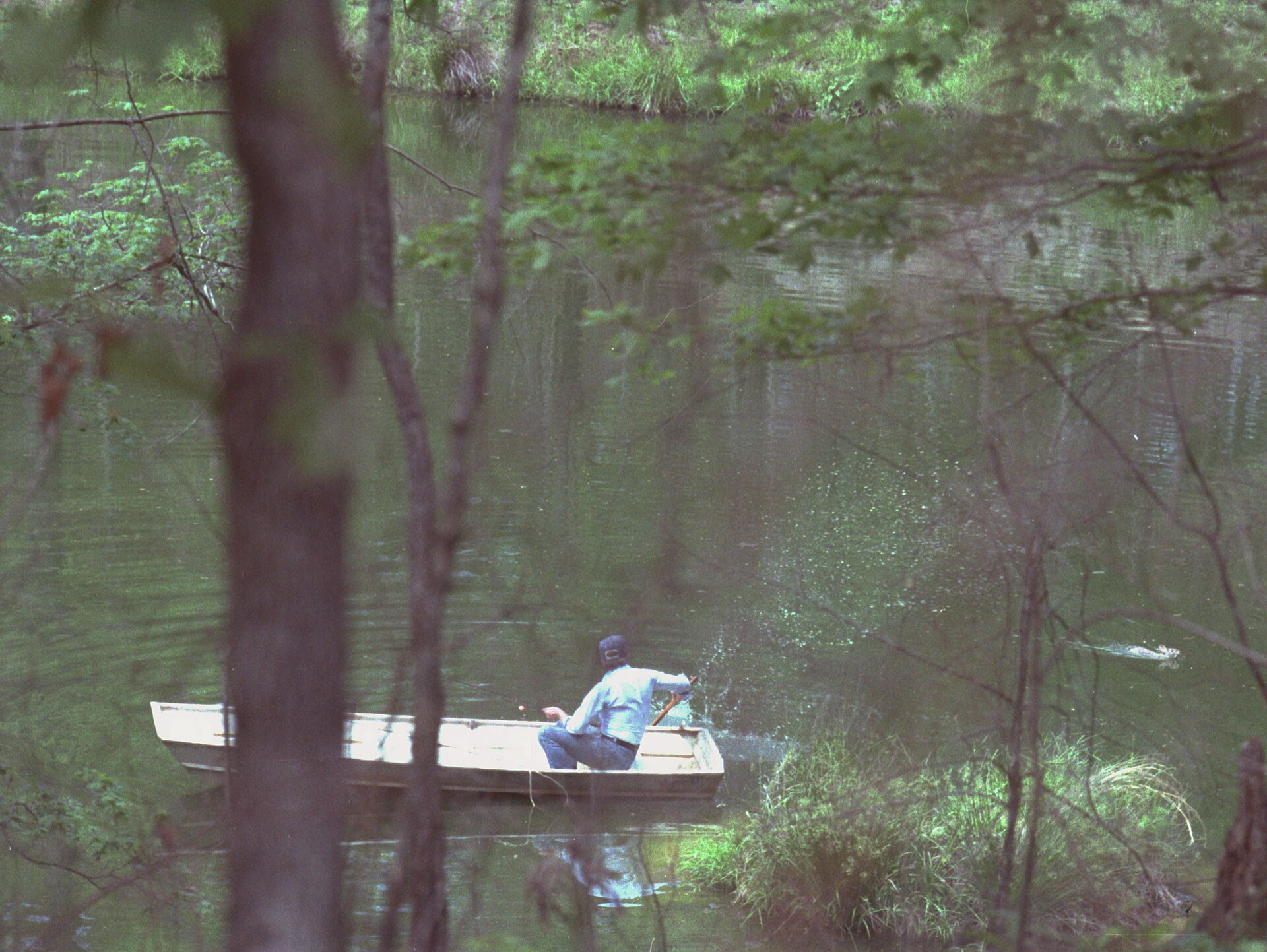 1920px-Jimmy_Carter_in_boat_chasing_away_swimming_rabbit%2C_Plains%2C_Georgia_-_19790420.jpg