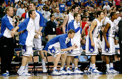 The-Duke-Blue-Devils-bench-cheers-on-the-players-on-the-court.jpg