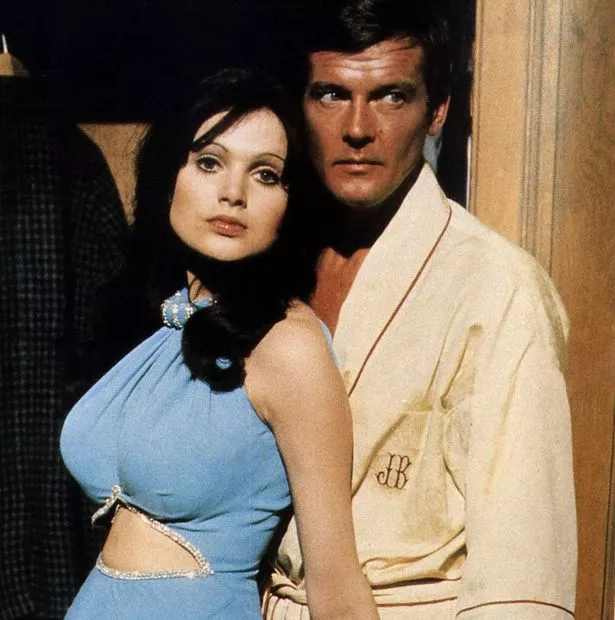 Madeline-Smith-as-Miss-Caruso-and-Roger-Moore-as-James-Bond-in-a-scene-from-the-James-Bond-movie-Live-and-Let-die-1973.jpg