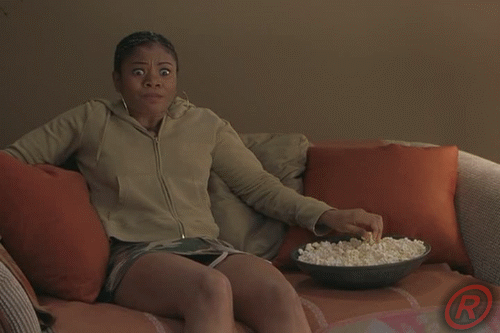 Brenda-Meeks-Eating-Popcorn-Watching-TV-In-Scary-Movie-Gif.gif