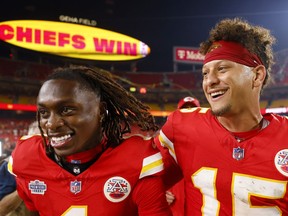 (L-R) Xavier Worthy #1 and Quarterback Patrick Mahomes #15 of the Kansas City Chiefs celebrate their 27-20 win over the Baltimore Ravens at Arrowhead Stadium on September 05, 2024 in Kansas City, Missouri.ACA