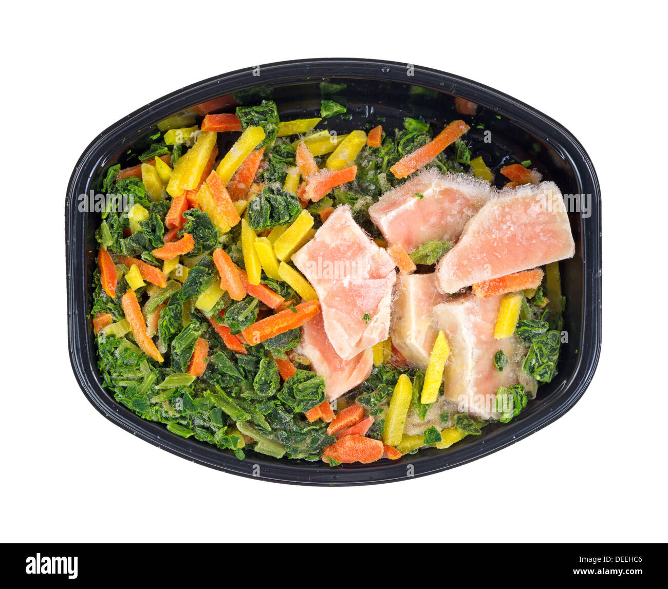 top-view-of-a-frozen-tv-dinner-of-salmon-spinach-carrots-and-pasta-DEEHC6.jpg